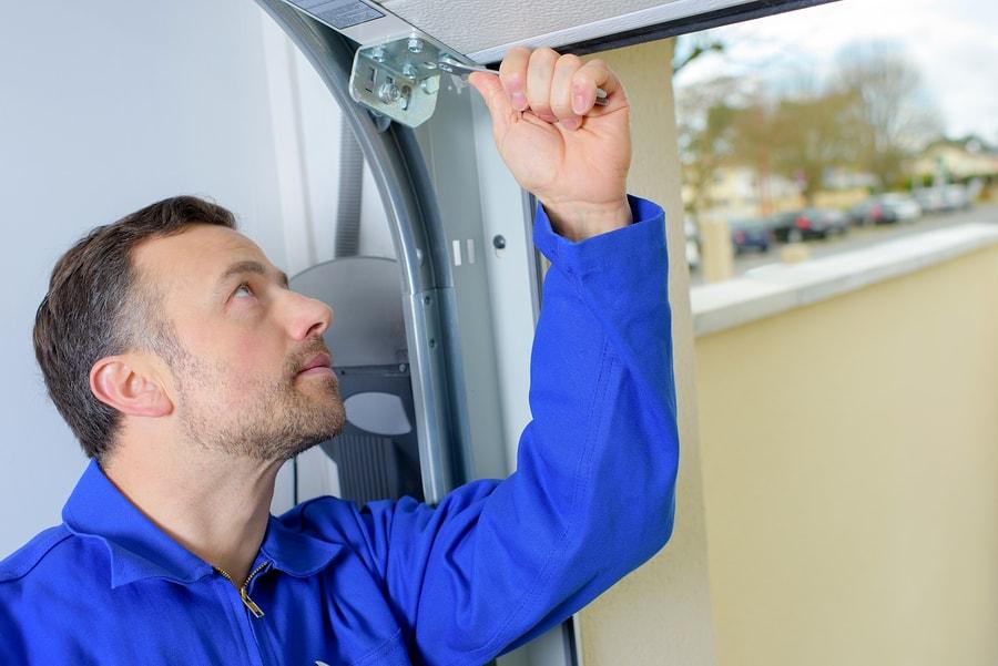 best garage service fresno, technician installing garage door