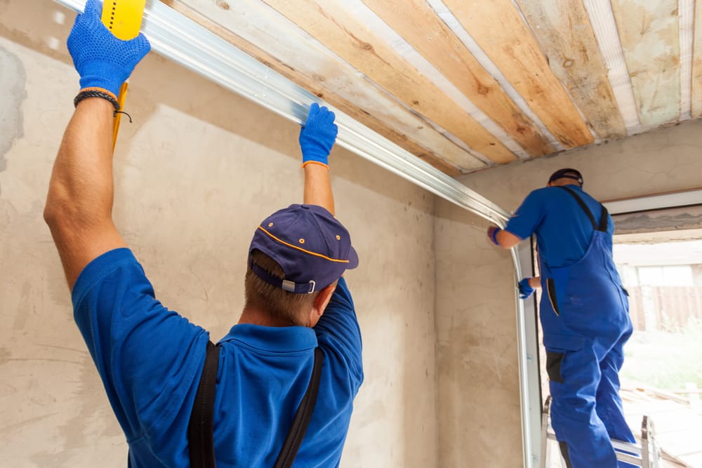 repairmen working after garage door quote